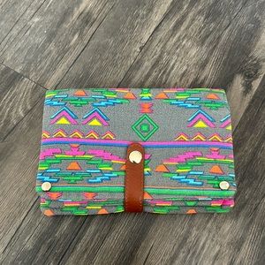 Francesca’s tribal print clutch